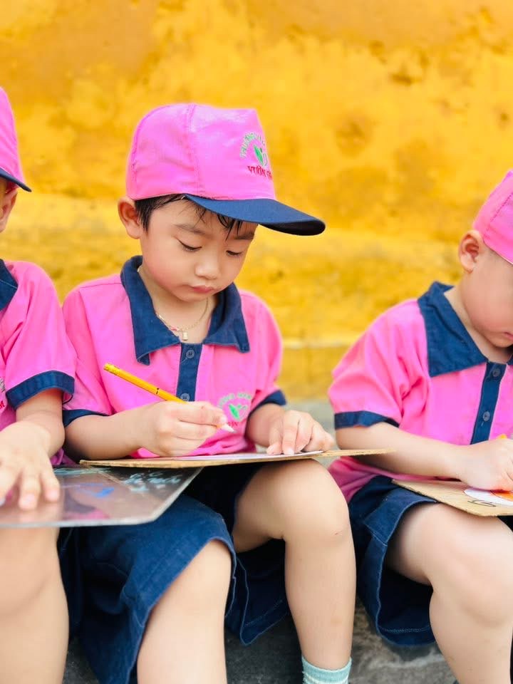 family walking in old town Hoi An
